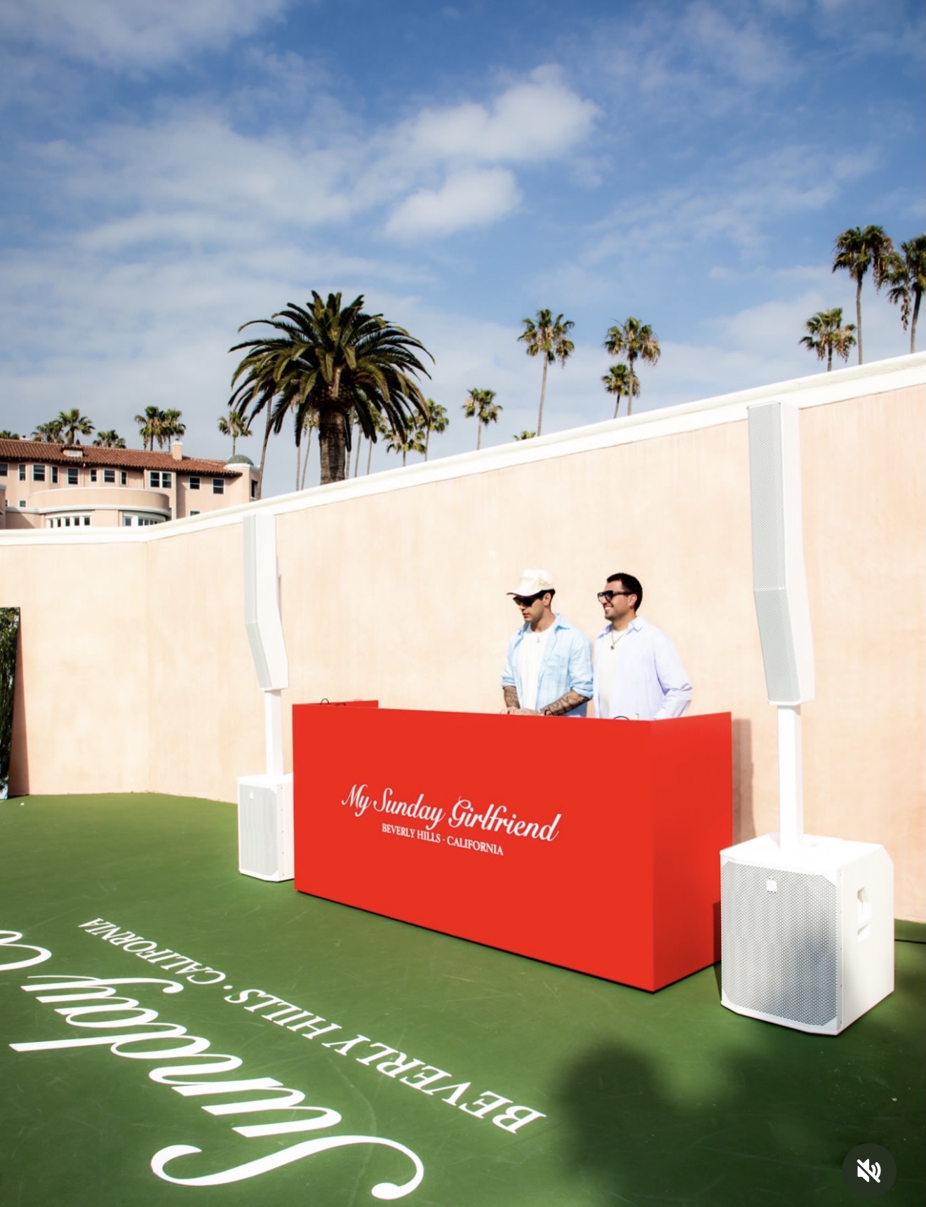 DJ at the red music booth on the tennis court